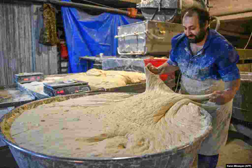 A baker prepares dough in Stepanakert on November 5.&nbsp;