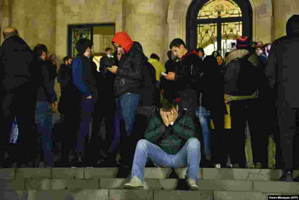 Crowds outside the parliament building in Yerevan.&nbsp;Protesters described feeling &quot;betrayed&quot; by the decision to end the fighting. More than 1,200 Armenian soldiers died in the latest war for Nagorno-Karabakh.
