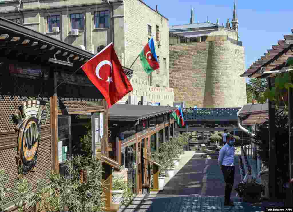 A restaurant decorated with Azerbaijani and Turkish flags in Baku's old town on October 14.&nbsp;