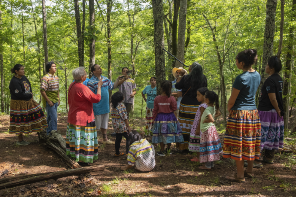 Briggs-Cloud and others identify tree species as part of their language immersion program. 