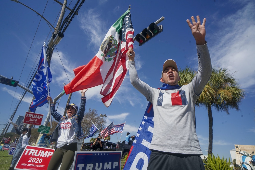 HOUSTON, TX - NOVEMBER 03: President Donald Trump supporters during a rally on West Gray Street on November 3, 2020 in Houston, Texas.  After a record-breaking early voting turnout, Americans head to the polls on the last day to cast their vote for incumbent U.S. President Donald Trump or Democratic nominee Joe Biden in the 2020 presidential election. (Photo by Sandy Huffaker/Getty Images)