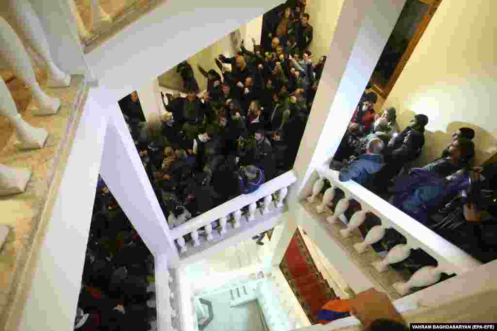 Protesters rampage inside a government building in Yerevan.&nbsp;The peace agreement would see Azerbaijan keep territory in Nagorno-Karabakh and surrounding areas taken from Armenian forces during the conflict. It also calls for Armenian troops to hand over areas they held outside the borders of Nagorno-Karabakh that had not been recaptured by Azerbaijani forces.