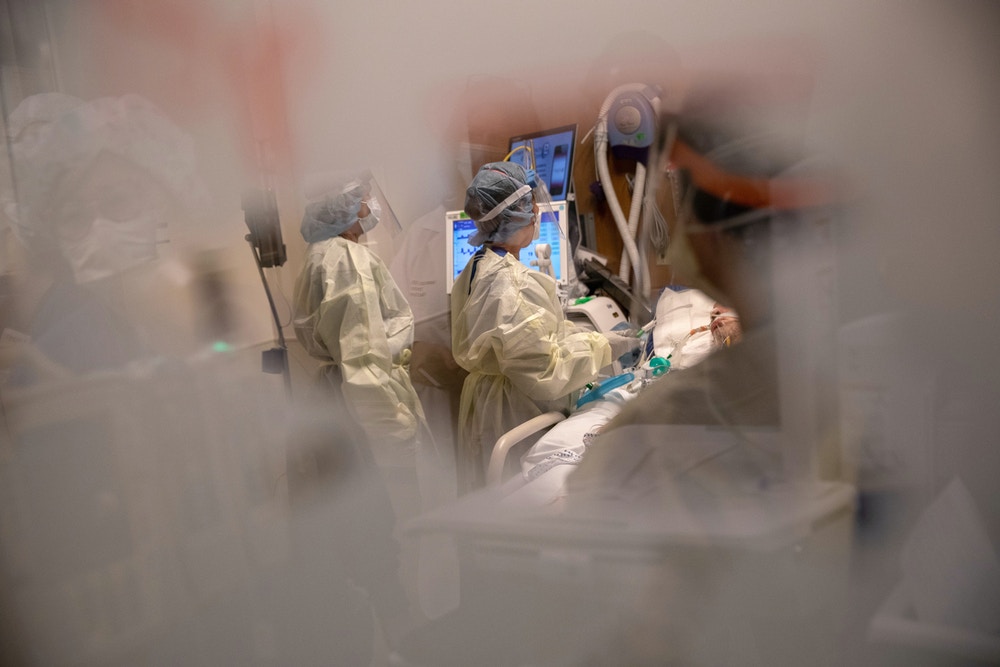 STAMFORD, CONNECTICUT - APRIL 24: (EDITORIAL USE ONLY) Nurses tend to a COVID-19 patient in a Stamford Hospital intensive care unit (ICU), on April 24, 2020 in Stamford, Connecticut. Stamford Hospital, like many across the US, opened additional ICUs to deal the the vast number of people suffering in the coronavirus pandemic. Stamford, with it's close proximity to New York City, has the highest number of COVID-19 patients in Connecticut. (Photo by John Moore/Getty Images)