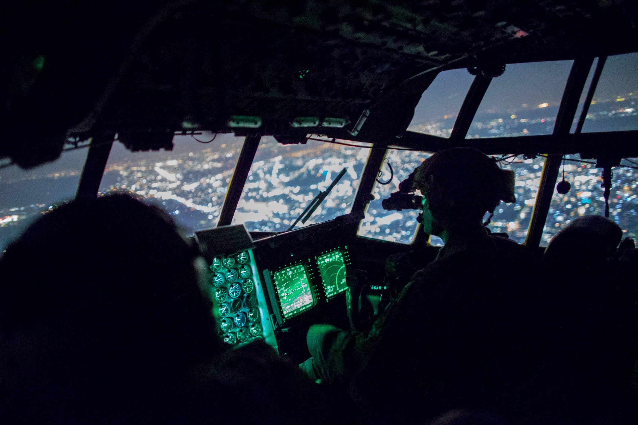 U.S. Air Force MC-130H Combat Talon II crew members from the 353rd Special Operations Group fly over the Kanto Plain, Japan, June 19, 2017, during Exercise Teak Jet. Exercise Teak Jet is a joint combined exchange training (JCET) focused on improving interoperability between U.S. Air Force and Japan Air Self-Defense Force. (U.S. Air Force photo by Yasuo Osakabe)